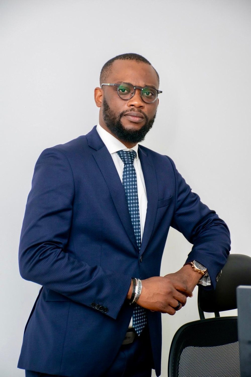 Marck-Antoine Jr. HODONOU, digital strategist, in a navy suit